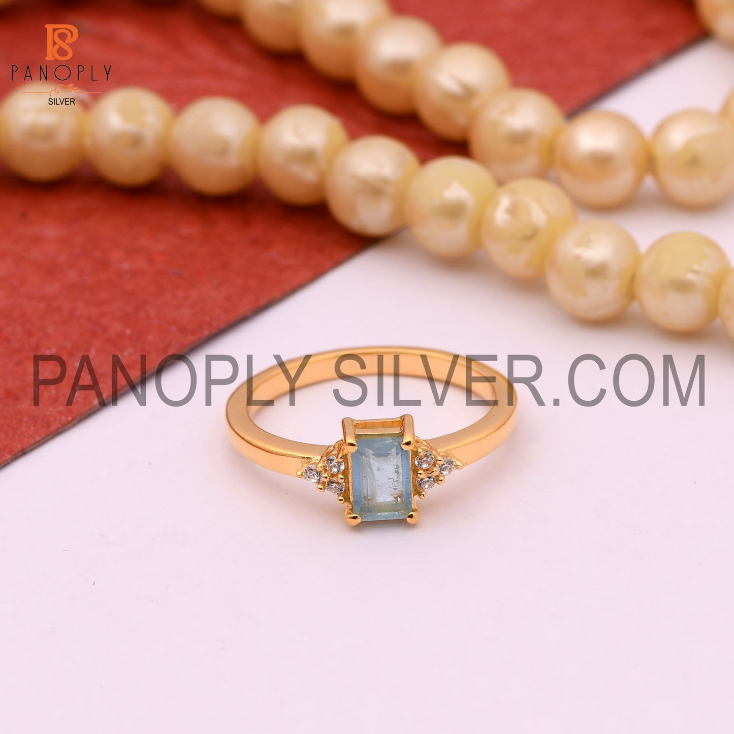Aquamarine & Cubic Zirconia 0.5 Micron Gold Plated Engagement Rings