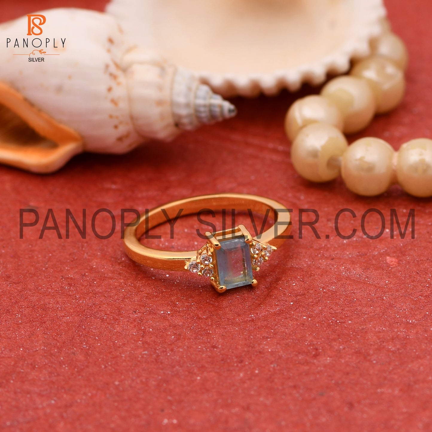 Aquamarine & Cubic Zirconia 0.5 Micron Gold Plated Engagement Rings