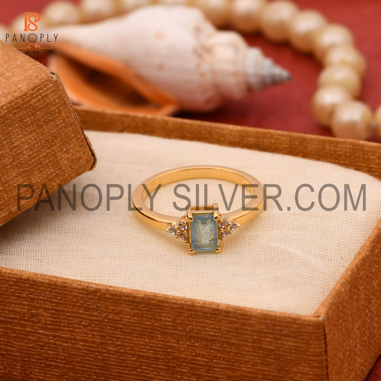 Aquamarine & Cubic Zirconia 0.5 Micron Gold Plated Engagement Rings