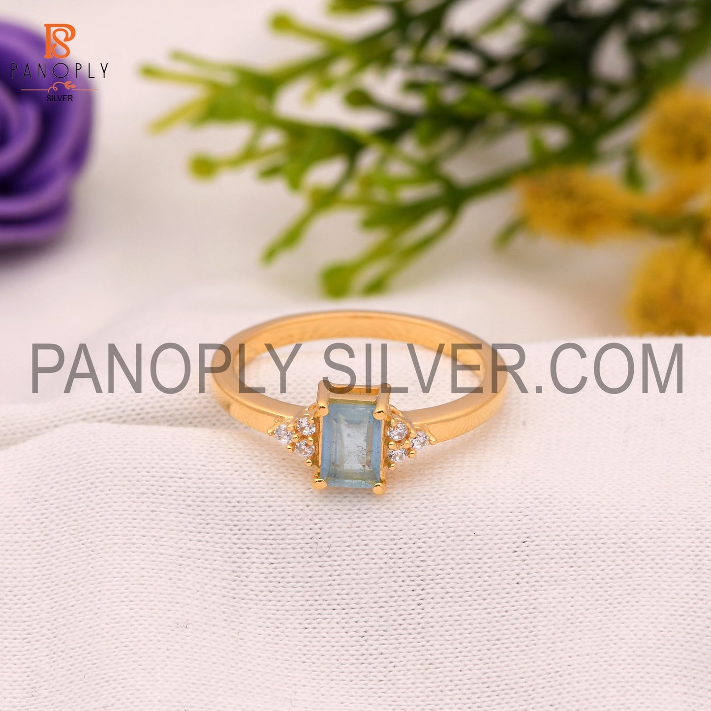 Aquamarine & Cubic Zirconia 0.5 Micron Gold Plated Engagement Rings