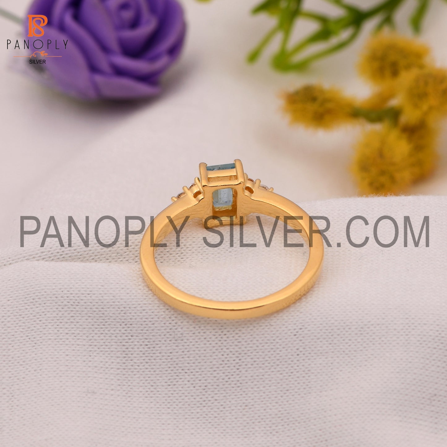 Aquamarine & Cubic Zirconia 0.5 Micron Gold Plated Engagement Rings