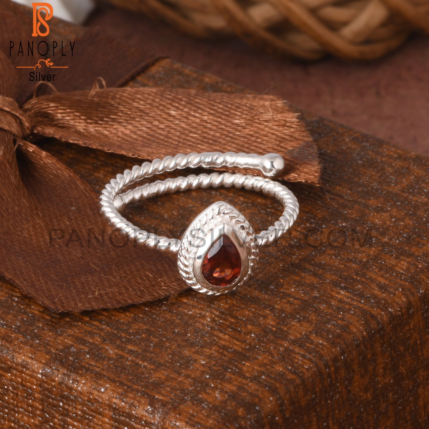 Twist Band Garnet Pear Shape 925 Sterling Silver Ring