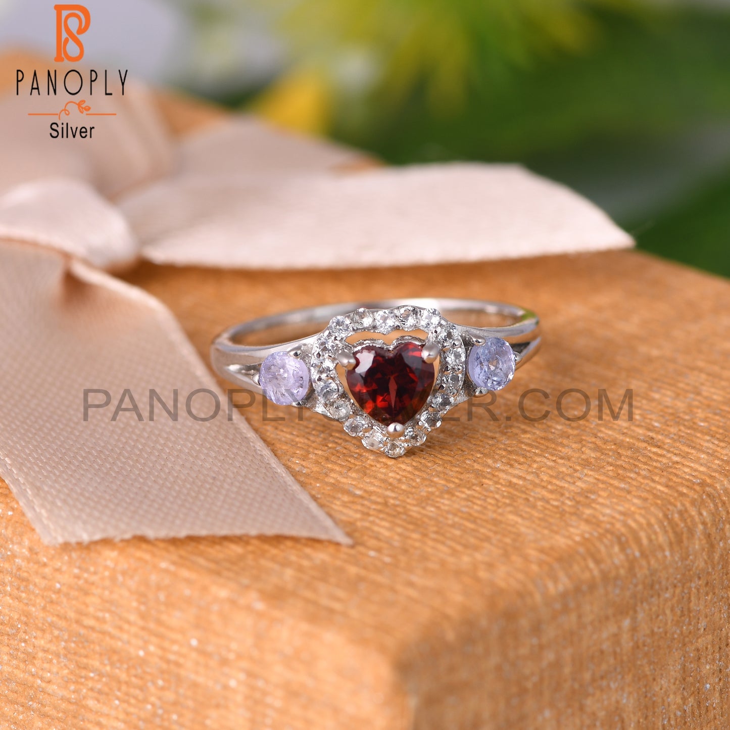 White Topaz ,Tanzanite & Garnet 925 Sterling Silver Ring