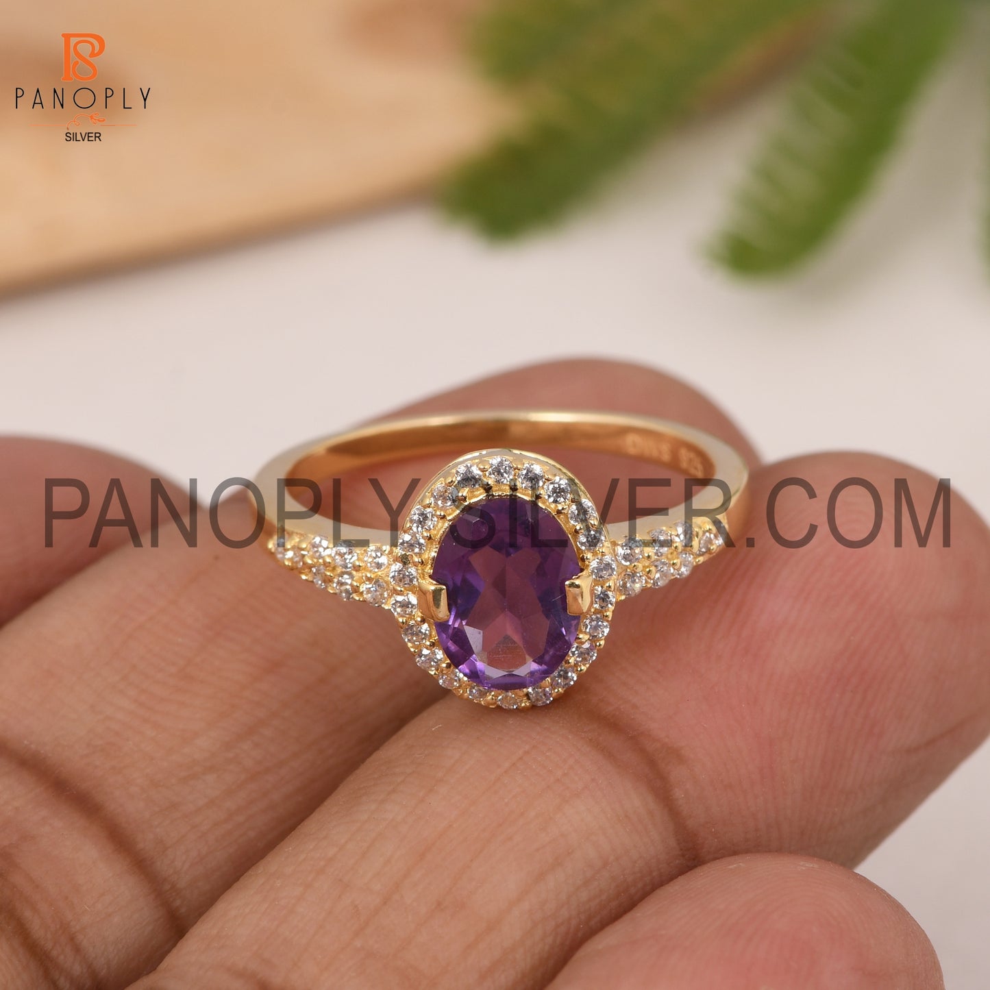 Round CZ And Oval Amethyst Engagement Ring