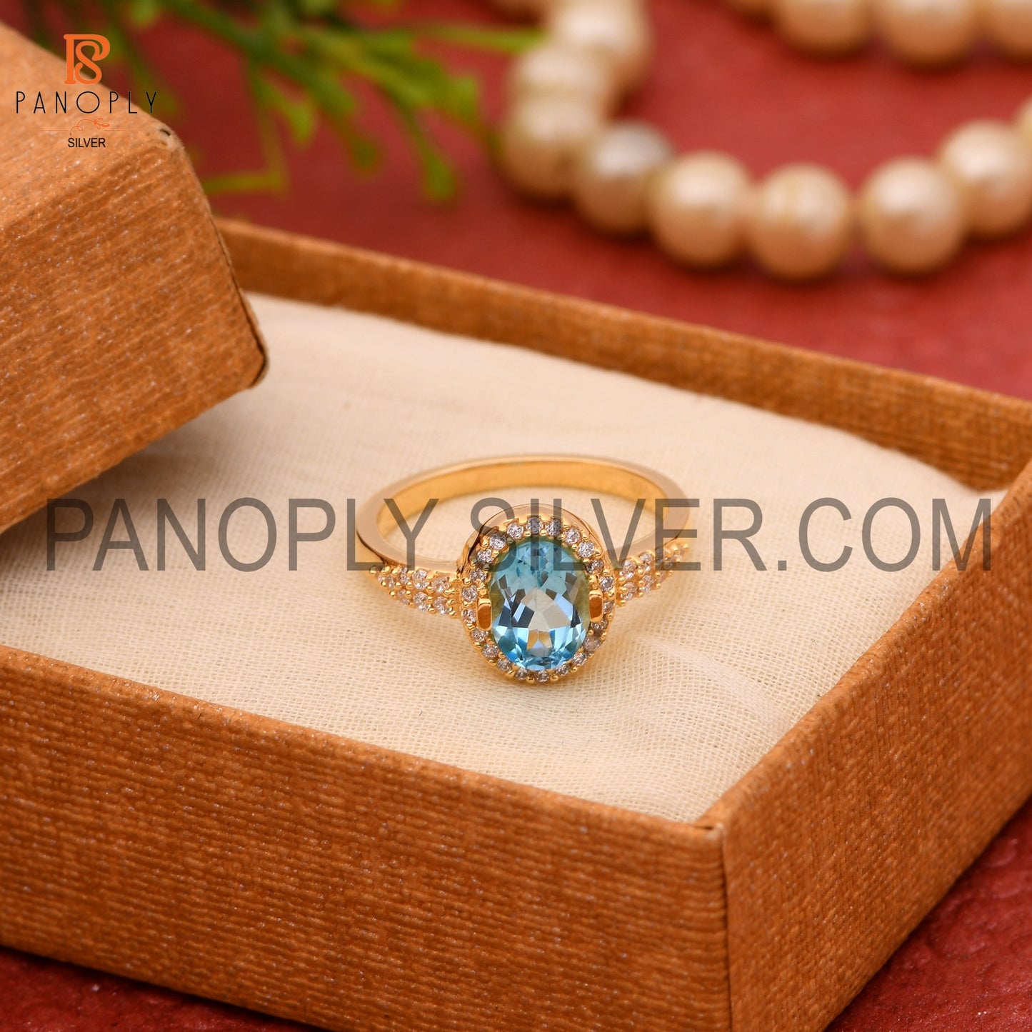 CZ And Oval Blue Topaz Wedding Ring